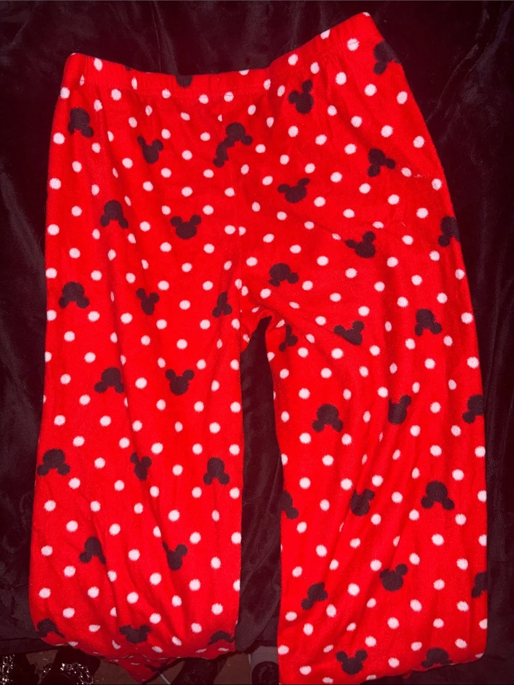 Disney Red Fleece Pajama Bottoms with Black Mickey Silhouettes and White Dots